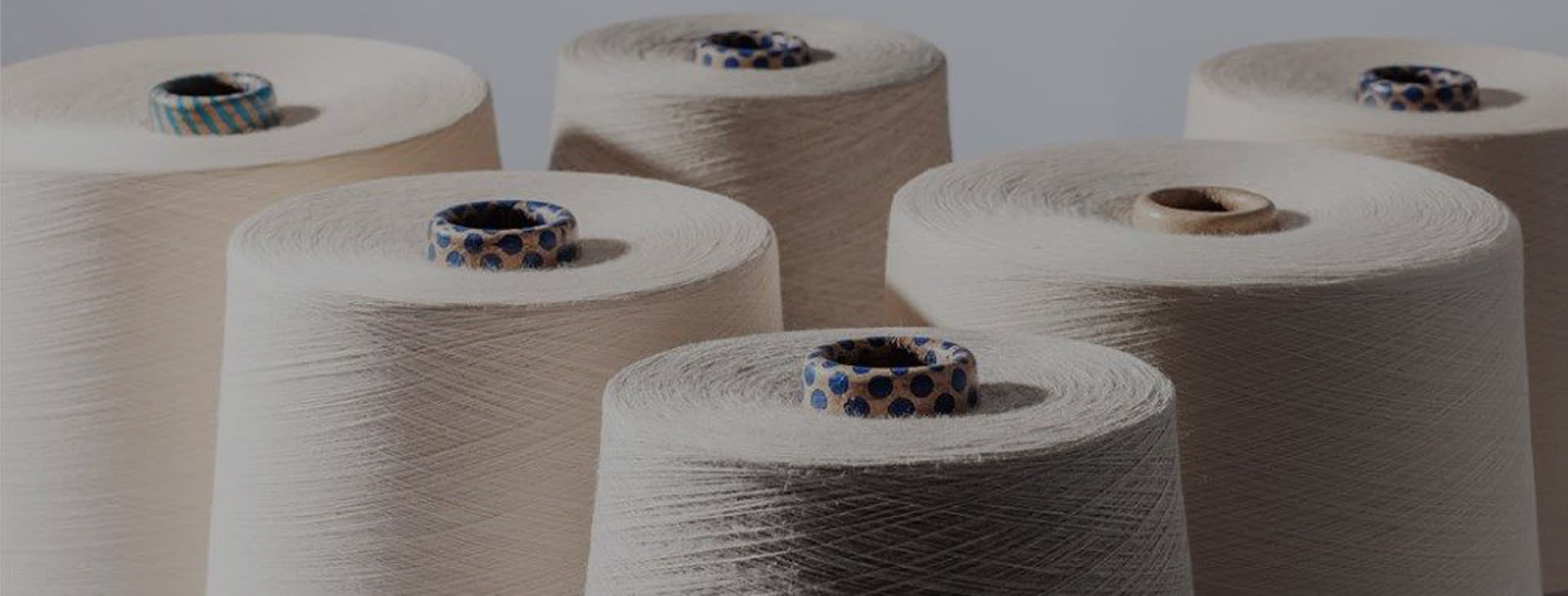 Raw white cotton yarn cones